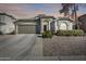 Beautiful single-story home with a landscaped front yard and attached two-car garage at 937 N Kingston St, Gilbert, AZ 85233