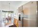 Stainless steel refrigerator in kitchen with adjacent counter space at 937 N Kingston St, Gilbert, AZ 85233