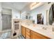 Main bathroom with double sinks, shower, and bathtub at 937 N Kingston St, Gilbert, AZ 85233