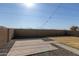 Backyard with patio, grass, and mountain views at 9519 W Trumbull Rd, Tolleson, AZ 85353