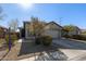 One-story house with a two-car garage and desert landscaping at 9519 W Trumbull Rd, Tolleson, AZ 85353