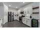 Well-equipped kitchen with stainless steel appliances and plenty of cabinet space at 9519 W Trumbull Rd, Tolleson, AZ 85353