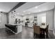 Bright kitchen with island and adjacent dining area, perfect for entertaining at 9519 W Trumbull Rd, Tolleson, AZ 85353