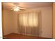 Bright bedroom with large window and beige carpet at 9714 W Edward Dr, Sun City, AZ 85351