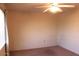 Bright bedroom with ceiling fan and window coverings at 9714 W Edward Dr, Sun City, AZ 85351