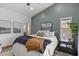 Relaxing bedroom featuring a large window and neutral-colored walls at 9837 E Pershing Ave, Scottsdale, AZ 85260