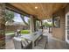 Outdoor patio featuring a large table and a view of the pool at 9837 E Pershing Ave, Scottsdale, AZ 85260