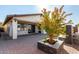 View of backyard patio, landscaping, and home exterior at 10012 E Tamery Ave, Mesa, AZ 85212
