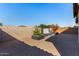Landscaped courtyard with water feature and brick wall at 10012 E Tamery Ave, Mesa, AZ 85212