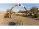 Community entrance with a unique disc golf arch at 10012 E Tamery Ave, Mesa, AZ 85212