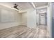 Bright hallway with wood-look floors and white door at 10012 E Tamery Ave, Mesa, AZ 85212