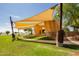 Modern outdoor stage with shade sails at 10012 E Tamery Ave, Mesa, AZ 85212