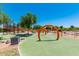 Community playground with modern play equipment at 10012 E Tamery Ave, Mesa, AZ 85212