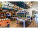 Community rec room with pool tables, foosball, and arcade games at 10012 E Tamery Ave, Mesa, AZ 85212