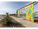 Community skatepark with colorful skateboard art installation at 10012 E Tamery Ave, Mesa, AZ 85212
