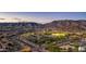 Aerial view of park, neighborhood and mountains at 1022 E Hiddenview Dr, Phoenix, AZ 85048