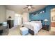 Bright bedroom with king-size bed and ensuite bathroom access at 1022 E Hiddenview Dr, Phoenix, AZ 85048