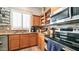 Kitchen features granite countertops and stainless steel appliances at 1022 E Hiddenview Dr, Phoenix, AZ 85048