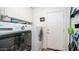 Convenient laundry room with washer, dryer, and extra storage at 1022 E Hiddenview Dr, Phoenix, AZ 85048