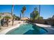 Inviting kidney-shaped pool with waterfall feature at 1022 E Hiddenview Dr, Phoenix, AZ 85048