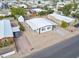 From above, see this neighborhood home with shed, minimal landscaping, small yard and nearby paved street at 104 N 114Th St, Apache Junction, AZ 85120