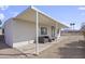 Spacious back patio with overhead roof, outdoor seating and desert views at 104 N 114Th St, Apache Junction, AZ 85120