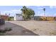 Spacious backyard with storage shed and mature trees at 104 N 114Th St, Apache Junction, AZ 85120