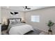 Serene bedroom with soft lighting, modern decor, neutral color palette, and comfortable furniture at 104 N 114Th St, Apache Junction, AZ 85120