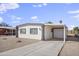 Inviting single-story home with attached carport and gravel yard at 104 N 114Th St, Apache Junction, AZ 85120
