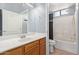 Well-lit bathroom features a shower-tub combo, spacious vanity, and tile floors at 10401 N Saguaro Blvd # 210, Fountain Hills, AZ 85268
