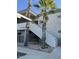 Condominium exterior with stairs, palm trees, and walkways at 10401 N Saguaro Blvd # 210, Fountain Hills, AZ 85268