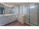 Main bathroom with double vanity, soaking tub, and shower at 10582 W Salter Dr, Peoria, AZ 85382