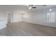 Open living area showcasing hardwood floors and a chandelier at 10582 W Salter Dr, Peoria, AZ 85382