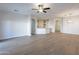 Open living space with hardwood floors and kitchen views at 10582 W Salter Dr, Peoria, AZ 85382