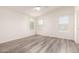 Bright bedroom with vinyl flooring and ceiling fan at 11596 W Sierra Dawn Blvd # 5, Surprise, AZ 85378