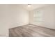 Simple bedroom with vinyl flooring and window blinds at 11596 W Sierra Dawn Blvd # 5, Surprise, AZ 85378