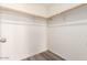 Walk-in closet with wood shelving at 11596 W Sierra Dawn Blvd # 5, Surprise, AZ 85378