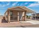 Single-wide manufactured home with carport and small front porch at 11596 W Sierra Dawn Blvd # 5, Surprise, AZ 85378