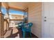 Small front porch with two teal chairs at 11596 W Sierra Dawn Blvd # 5, Surprise, AZ 85378