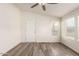 Living room with wood-look floors and ceiling fan at 11596 W Sierra Dawn Blvd # 5, Surprise, AZ 85378