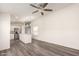 Bright living room with ceiling fan and laminate wood floors at 11596 W Sierra Dawn Blvd # 5, Surprise, AZ 85378