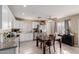 Spacious kitchen with white cabinetry, tile floors, and stainless steel appliances at 11971 W Granada Rd Rd, Avondale, AZ 85392