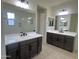 Double vanity bathroom with large walk-in shower at 12223 W Marguerite Ave, Avondale, AZ 85323