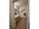 Bright bathroom with a wood vanity, decorative accents and framed mirror at 14575 W Mountain View Blvd # 11210, Surprise, AZ 85374