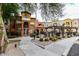 Condo building exterior with pergola and landscaping at 14575 W Mountain View Blvd # 11210, Surprise, AZ 85374
