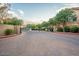 Gated entrance to the community with brick pavers at 14575 W Mountain View Blvd # 11210, Surprise, AZ 85374