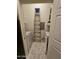 Laundry room with washer, dryer, and shelving at 14575 W Mountain View Blvd # 11210, Surprise, AZ 85374