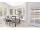 Bright breakfast nook with a table, chairs, a window seat, and natural light at 1582 W Chicago St, Chandler, AZ 85224
