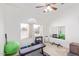 Bright workout room featuring fitness equipment, mirror and natural light from the lovely window at 1582 W Chicago St, Chandler, AZ 85224