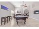 Recreational space featuring a pool table, wet bar, tile flooring, and high ceilings at 1582 W Chicago St, Chandler, AZ 85224